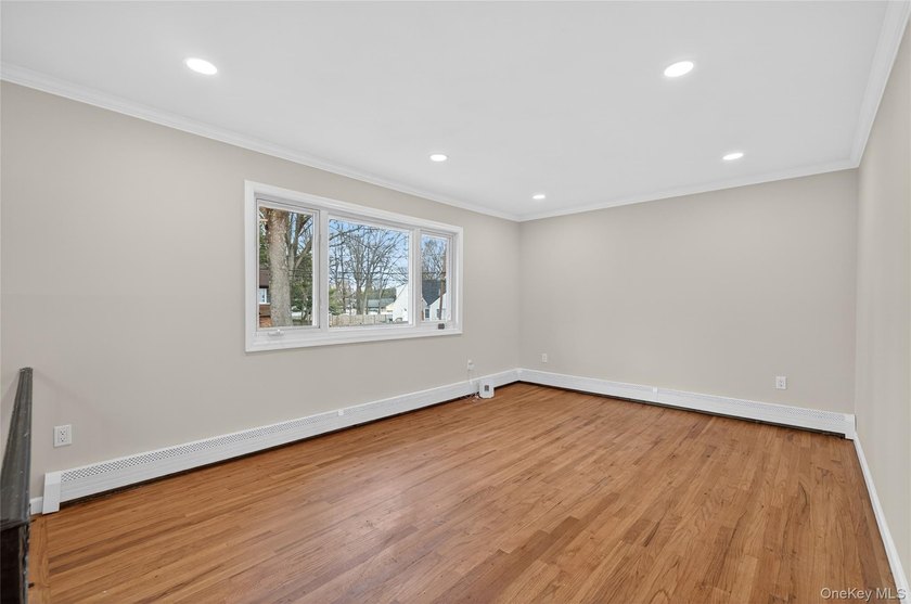 Beautifully renovated 4-bedroom Hi-Ranch offering exceptional - photo 4