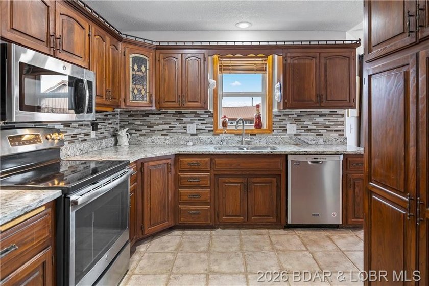 WOW! From the minute you walk in the door, the lake view is - photo 5