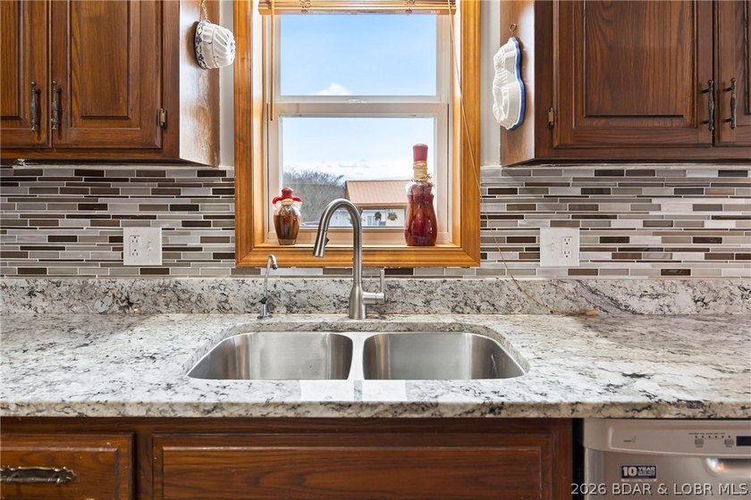 WOW! From the minute you walk in the door, the lake view is - photo 7