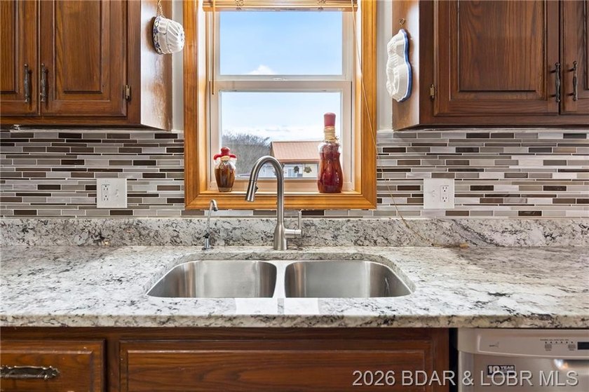 WOW! From the minute you walk in the door, the lake view is - photo 7