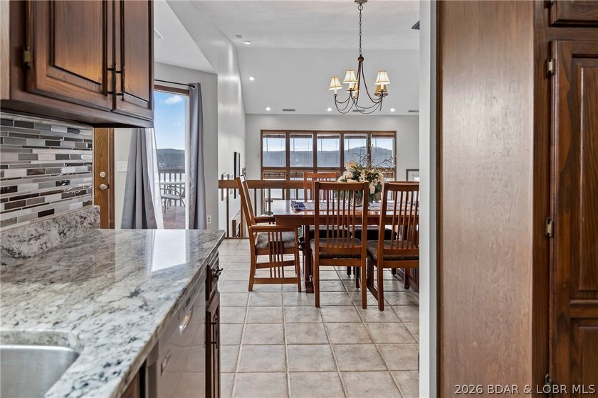 WOW! From the minute you walk in the door, the lake view is - photo 9