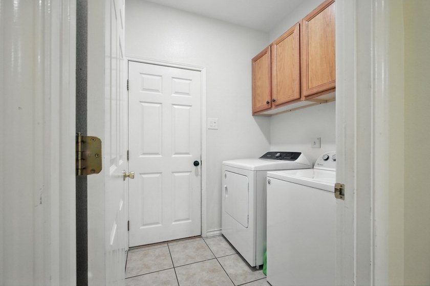Welcome to your coastal retreat! This 3-bedroom, 2-bath beach - photo 11