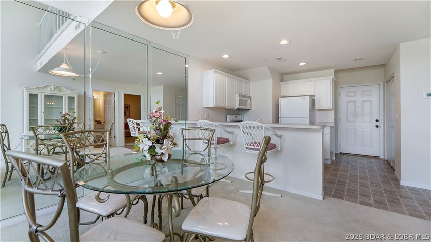 Discover this top-floor 3-bedroom, 3-bathroom condo with a - photo 6