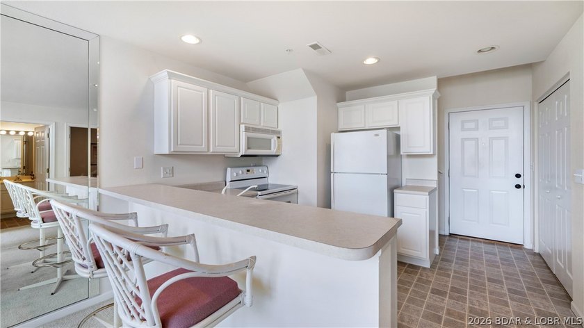 Discover this top-floor 3-bedroom, 3-bathroom condo with a - photo 7