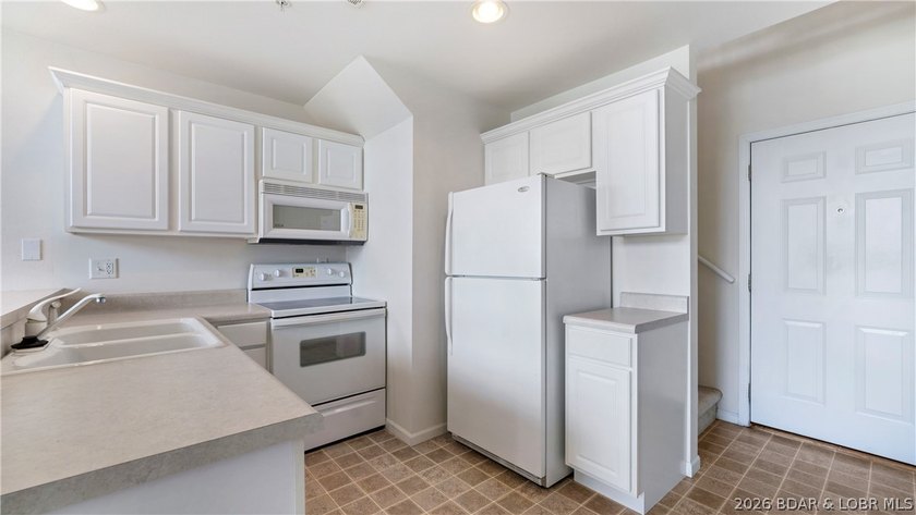 Discover this top-floor 3-bedroom, 3-bathroom condo with a - photo 8