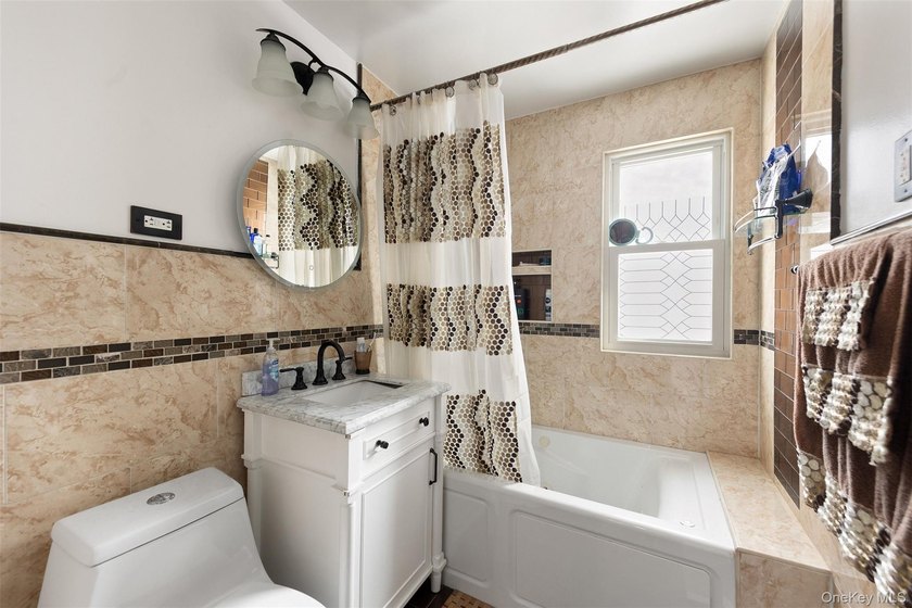 This well maintained multi-level home features hardwood floors - photo 11
