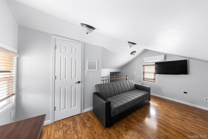 This well maintained multi-level home features hardwood floors - photo 15