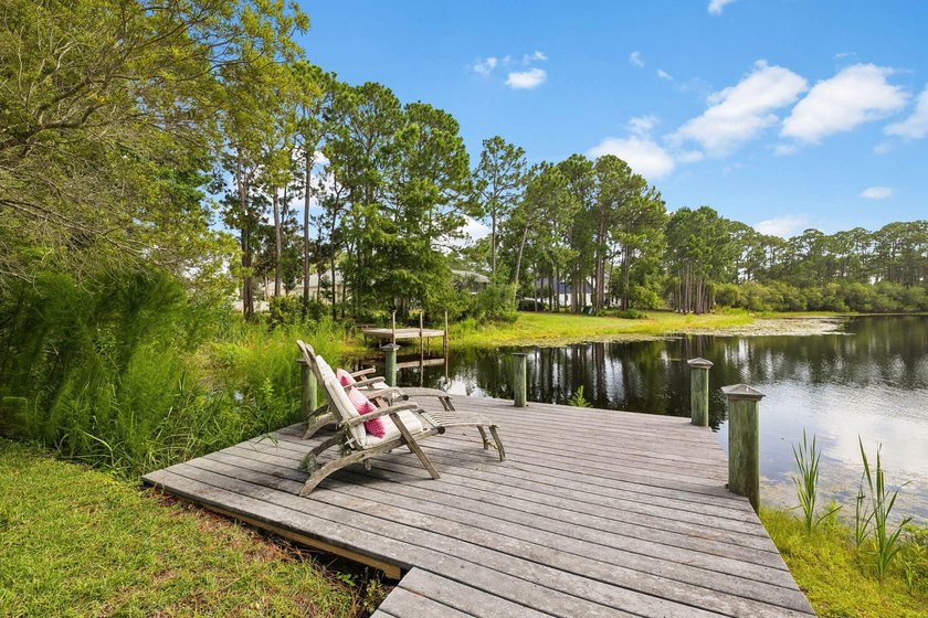Nestled on a private one-acre homesite overlooking the tranquil - photo 17