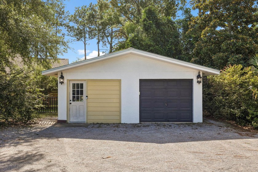 Nestled on a private one-acre homesite overlooking the tranquil - photo 42