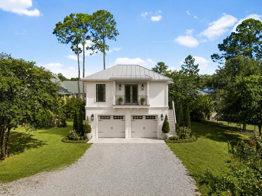 Nestled on a private one-acre homesite overlooking the tranquil - photo 44