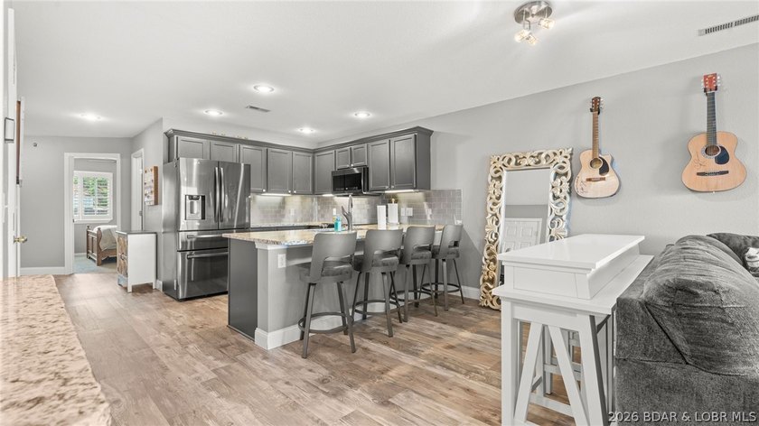 Experience luxury lake living at its finest in this - photo 12