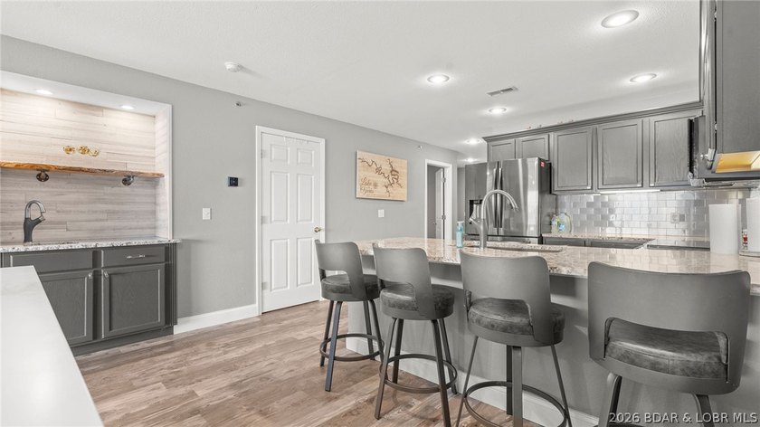 Experience luxury lake living at its finest in this - photo 13