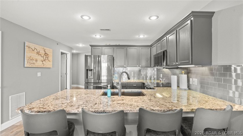Experience luxury lake living at its finest in this - photo 15