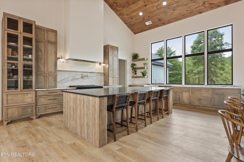 Set on 5.59 acres, this new custom ranch offers a beautiful - photo 15