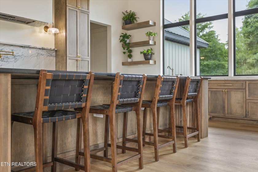 Set on 5.59 acres, this new custom ranch offers a beautiful - photo 16