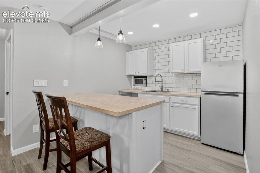 This mature 0.28-acre Pine Creek property offers a thoughtfully - photo 18
