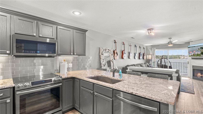 Experience luxury lake living at its finest in this - photo 19