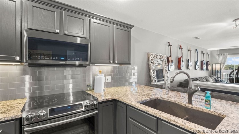 Experience luxury lake living at its finest in this - photo 20