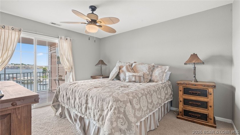 Experience luxury lake living at its finest in this - photo 25