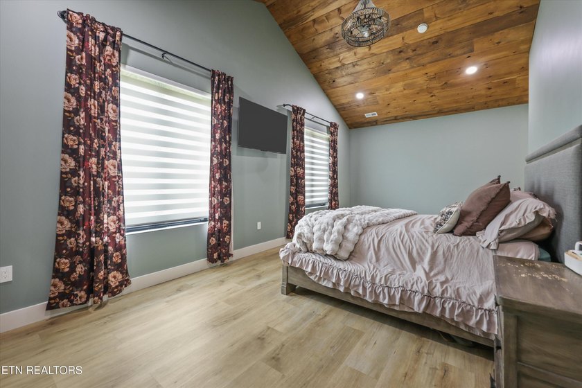 Set on 5.59 acres, this new custom ranch offers a beautiful - photo 30