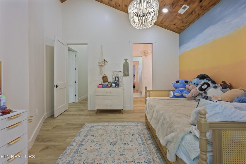 Set on 5.59 acres, this new custom ranch offers a beautiful - photo 40