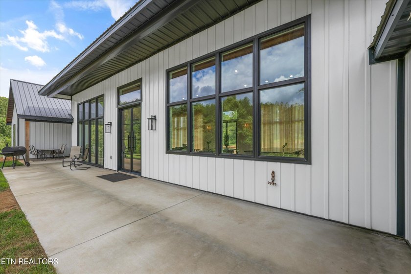 Set on 5.59 acres, this new custom ranch offers a beautiful - photo 46