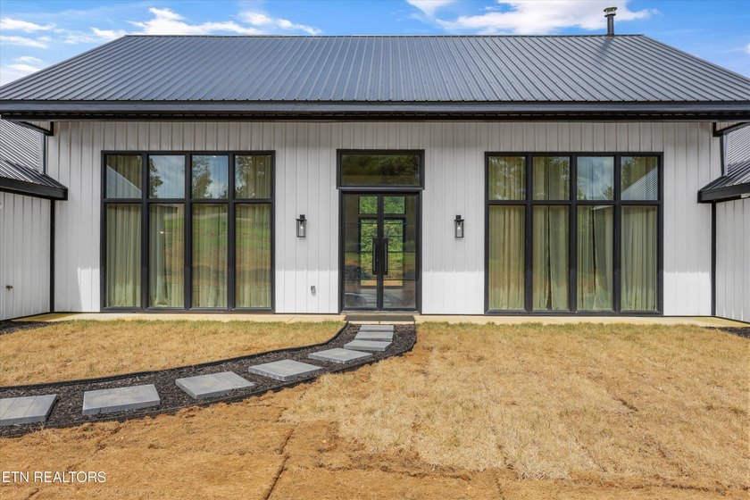 Set on 5.59 acres, this new custom ranch offers a beautiful - photo 49