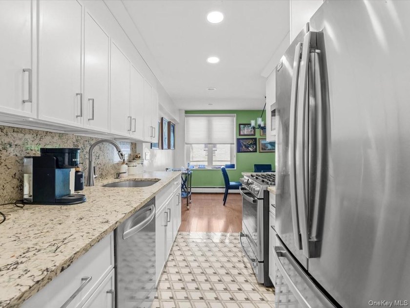 Mint! Corner 2 Bedroom and 2 New Baths. Brand new eat-in kitchen - photo 11