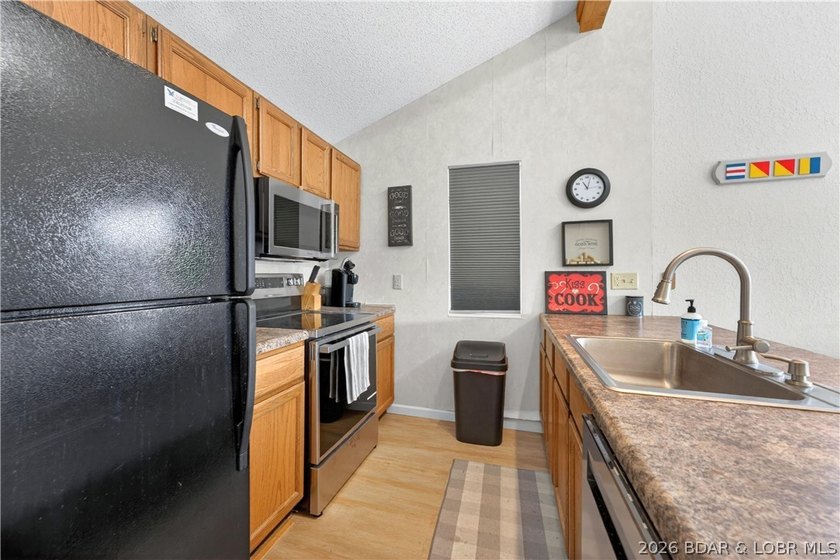 At Wrenwood Condominiums, tucked along the quieter end of - photo 8