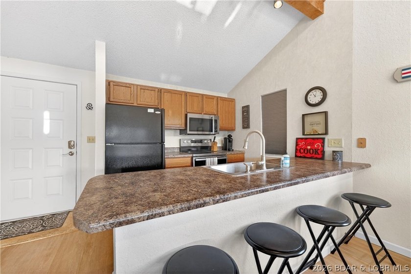 At Wrenwood Condominiums, tucked along the quieter end of - photo 9