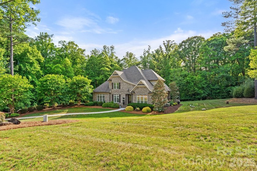Tucked away on 2.5 private acres in desirable Stoney Point, this - photo 3