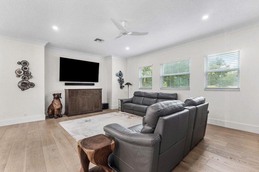 Situated on nearly 2 acres in the gated golf and equestrian - photo 20