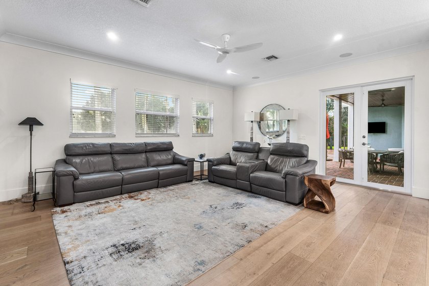 Situated on nearly 2 acres in the gated golf and equestrian - photo 21