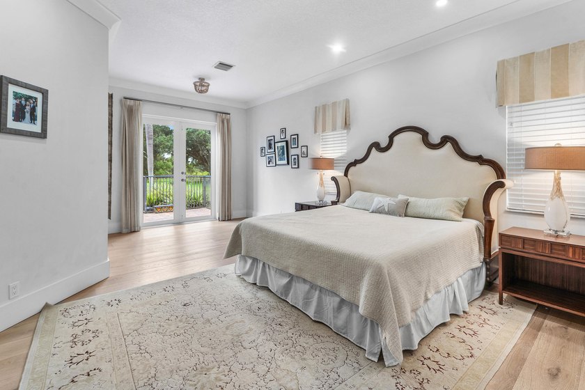 Situated on nearly 2 acres in the gated golf and equestrian - photo 22