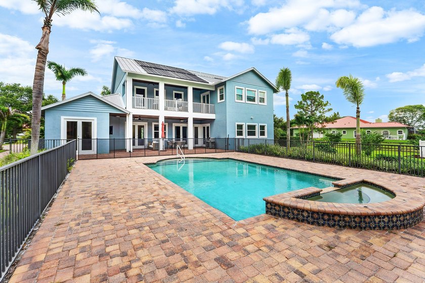 Situated on nearly 2 acres in the gated golf and equestrian - photo 30
