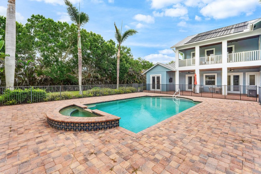 Situated on nearly 2 acres in the gated golf and equestrian - photo 31