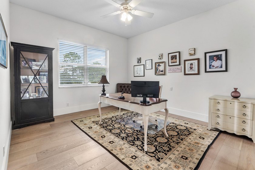 Situated on nearly 2 acres in the gated golf and equestrian - photo 40