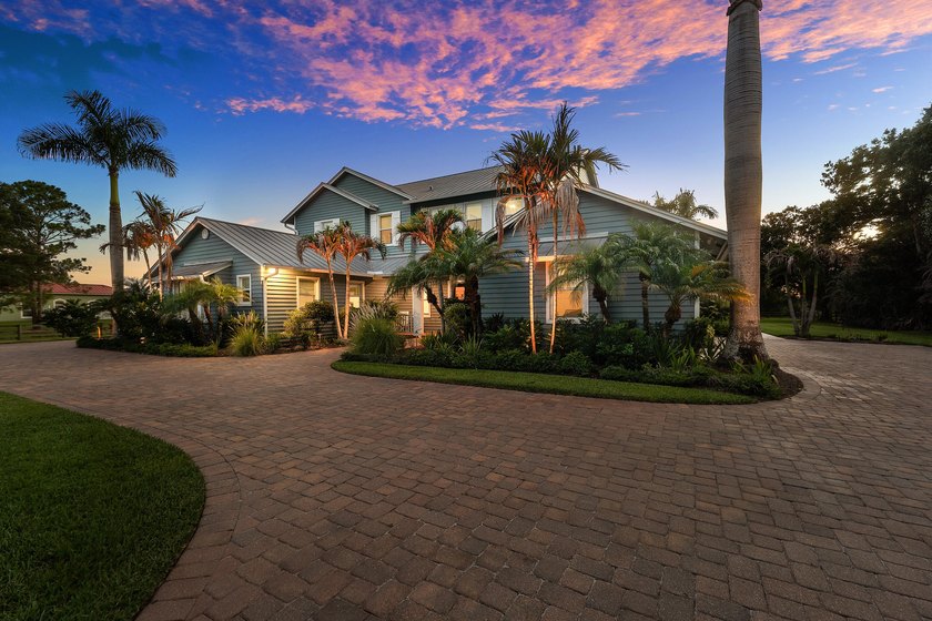 Situated on nearly 2 acres in the gated golf and equestrian - photo 49