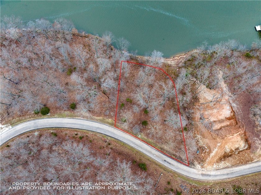 Nice Lake Front Building Lot in Eagle Bay Subdivisionmunity - photo 3