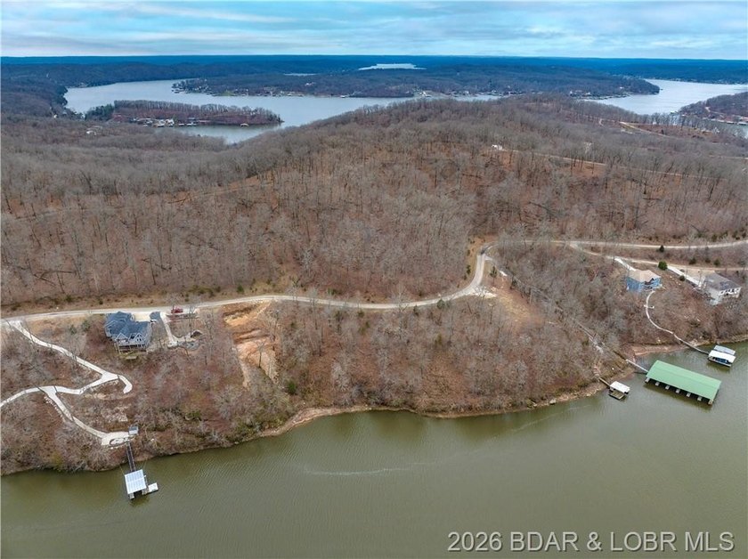 Nice Lake Front Building Lot in Eagle Bay Subdivisionmunity - photo 7