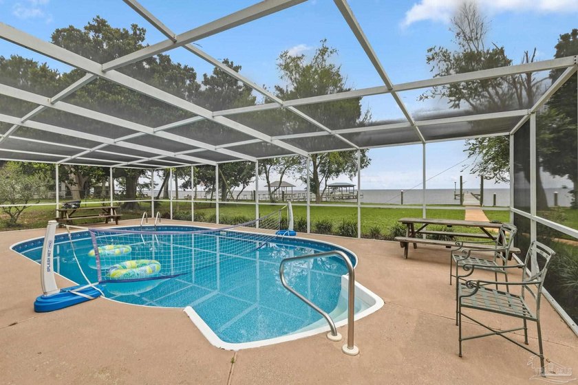108 feet of East Bay waterfront with a private dock and direct - photo 4