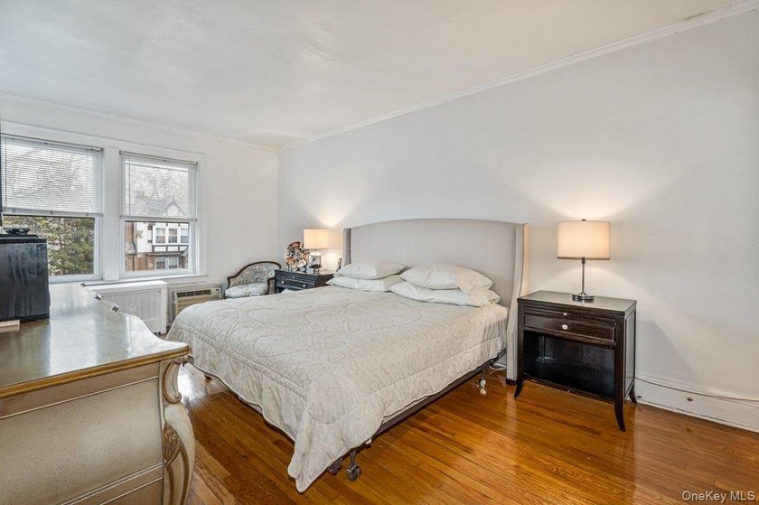 Updated one-family attached brick townhouse nestled in the heart - photo 9