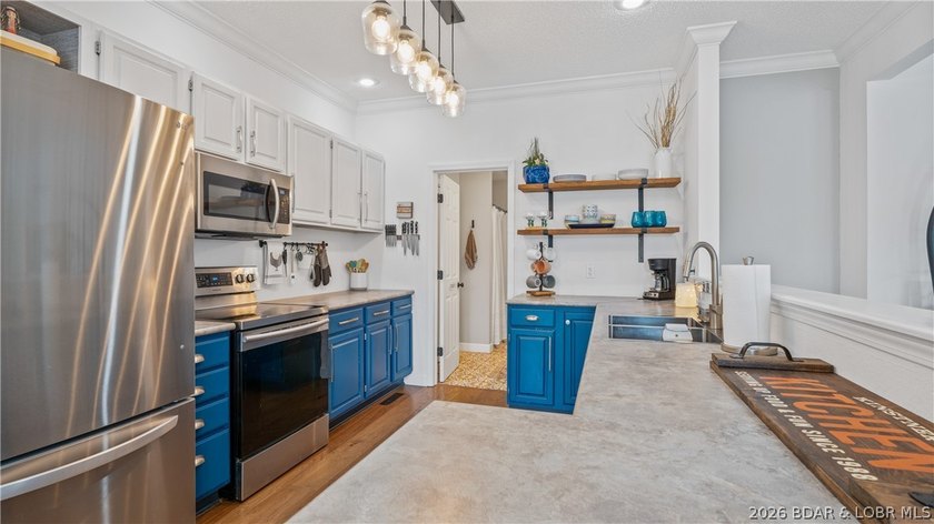 Check out this TWO story lakefront condo at the beautiful Shores - photo 6