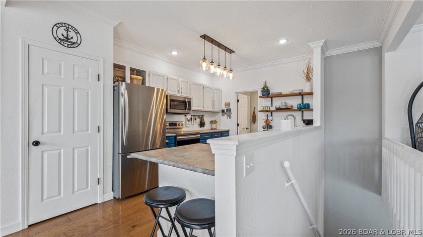 Check out this TWO story lakefront condo at the beautiful Shores - photo 8