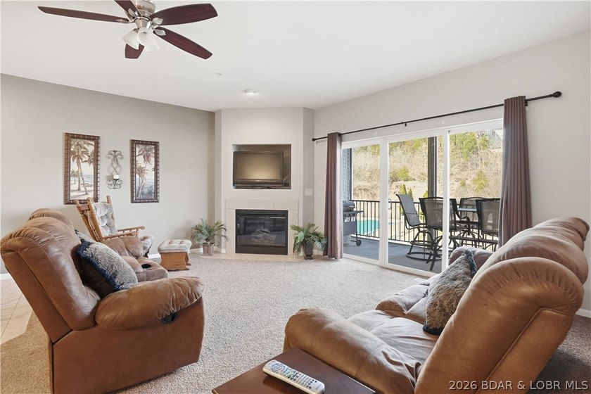 This spacious 5-bedroom, 3-bathroom two-story condo located in - photo 2