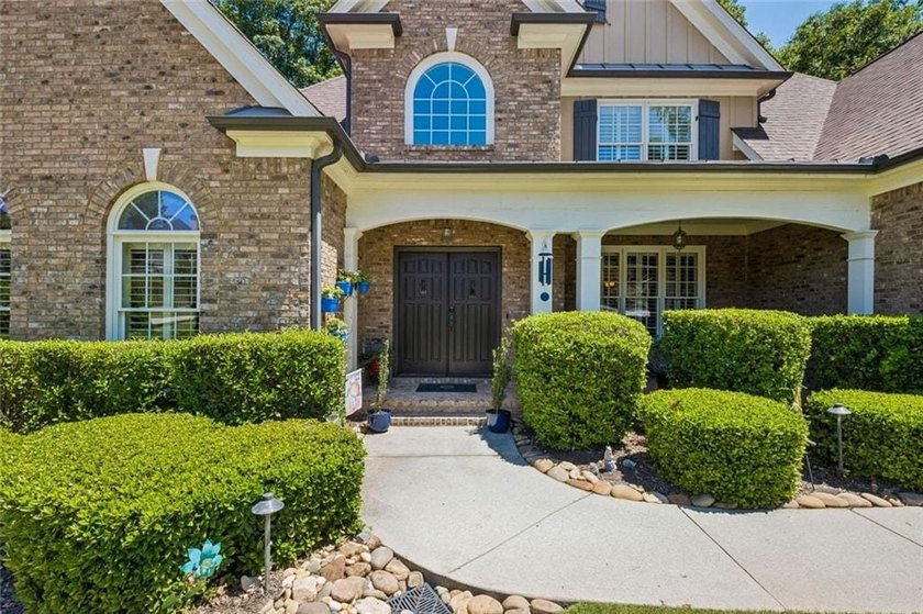Lovely 2 story home located on Hamilton Mill's largest lot (1.61 - photo 2