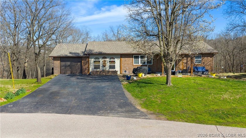 Welcome to your private retreat in the heart of Camdenton, where - photo 4