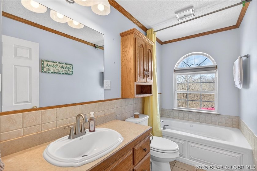 Welcome to your private retreat in the heart of Camdenton, where - photo 6