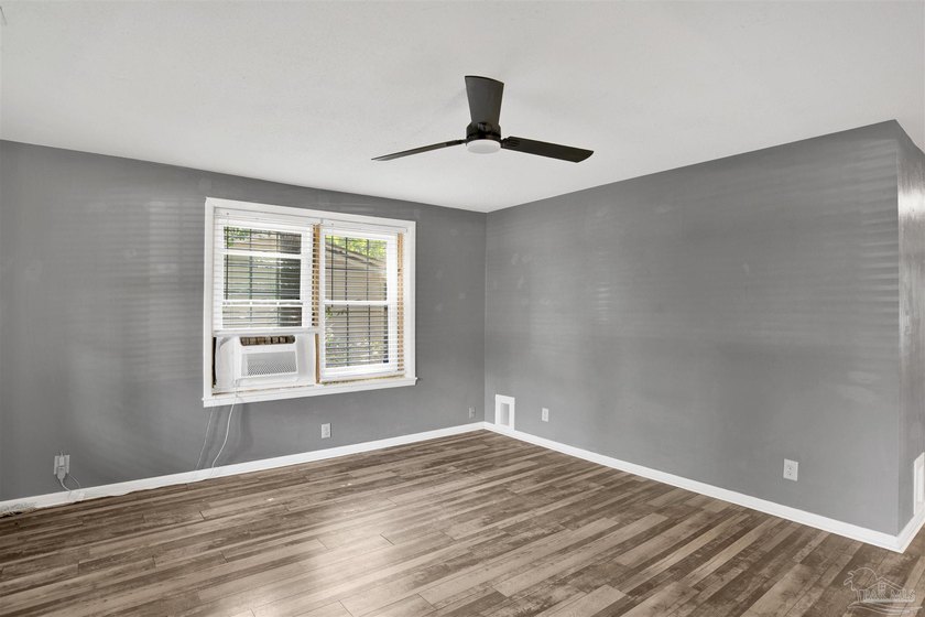 SHORT SALE / AS IS -- Welcome to this charming 3-bedroom - photo 3