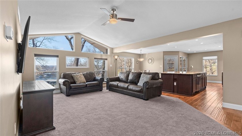 Experience elevated lakefront living in this luxury 4-bedroom, 3 - photo 3